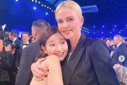 Actor Park So-Dam uploaded a picture with Hollywood star Charlize Theron.
