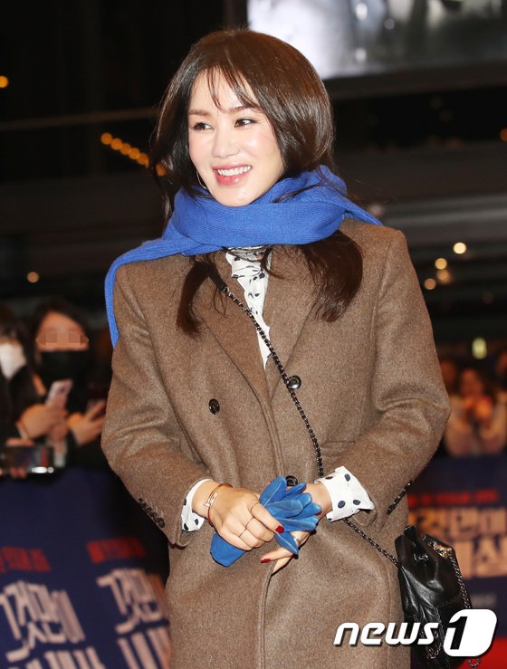 Uhm Jung-Hwa Says She is Healthy, Resting at Home After Returning from