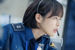 Lee Ha-Na as Director Kang in 